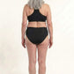 444 Studios Elva incontinence panties on model, mid-rise, 90 ml, black, from behind