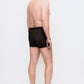 444 Studios Ultra incontinence underwear for men on model, boxers, 90 ml, black, from behind, distance