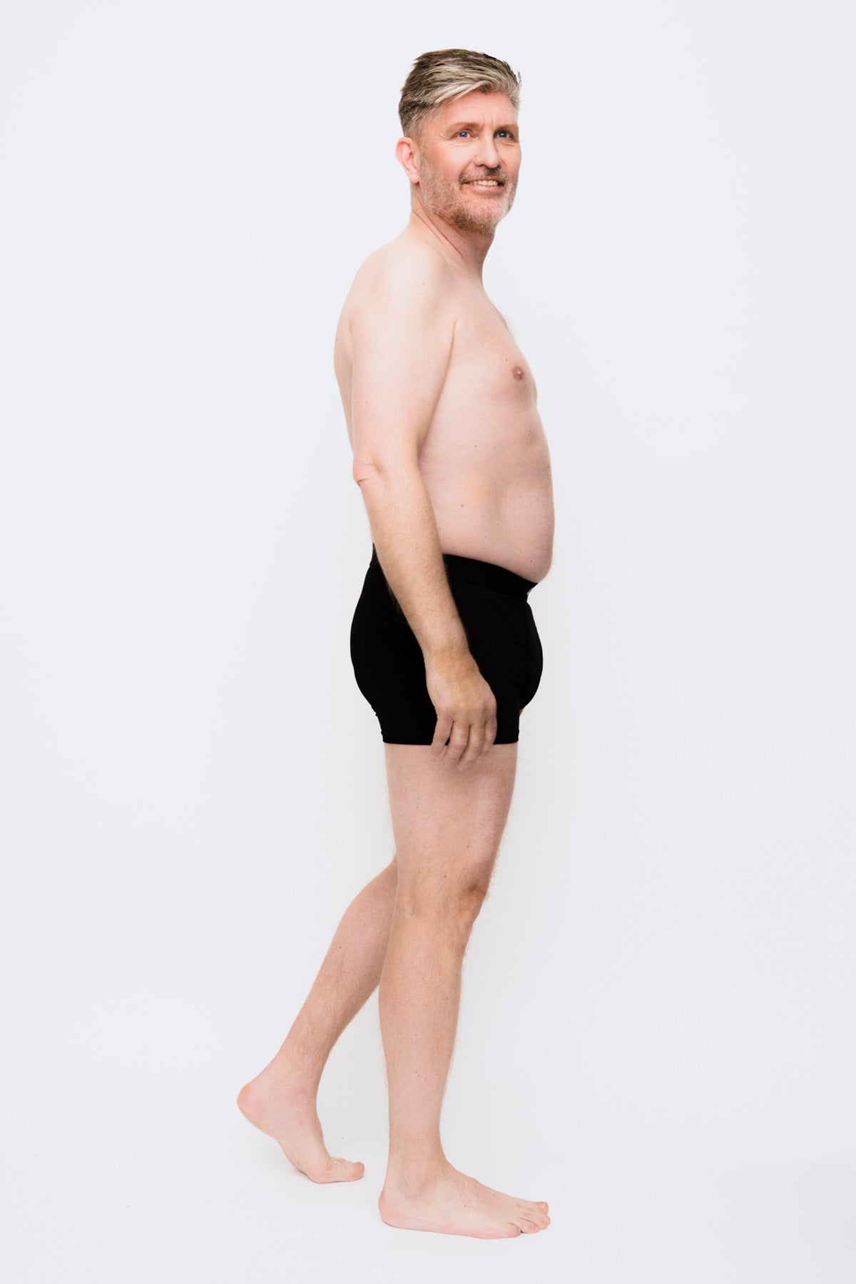 444 Studios Ultra incontinence underwear for men on model, boxers, 90 ml, black, side, distance